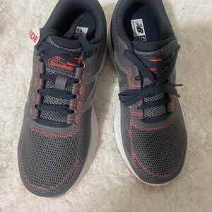 New Balance orange and gray sneakers